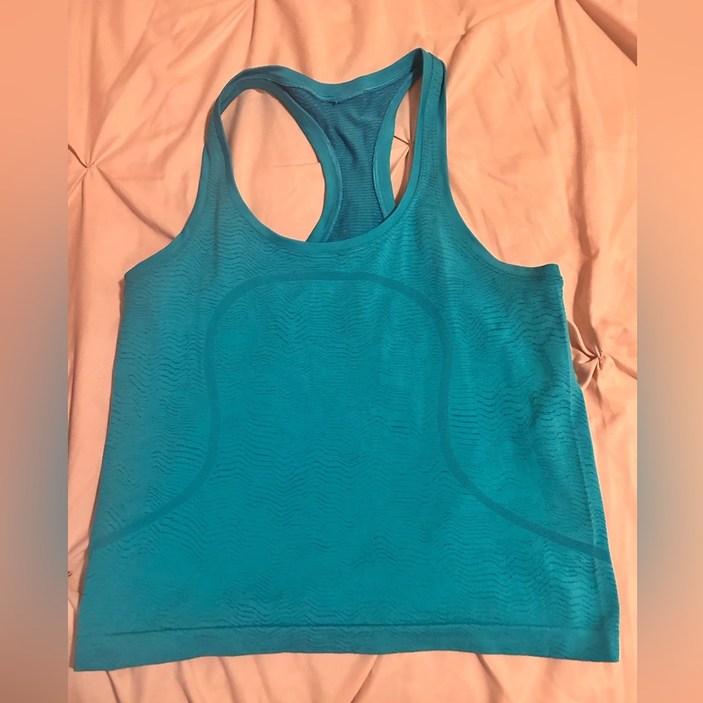 lululemon size size swiftly tech 2.0 race length in teal with a pattern